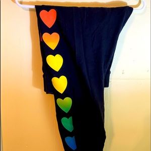 Black leggings with rainbow hearts